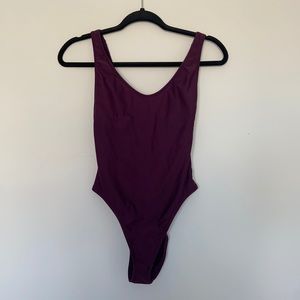 One piece purple bathing suit